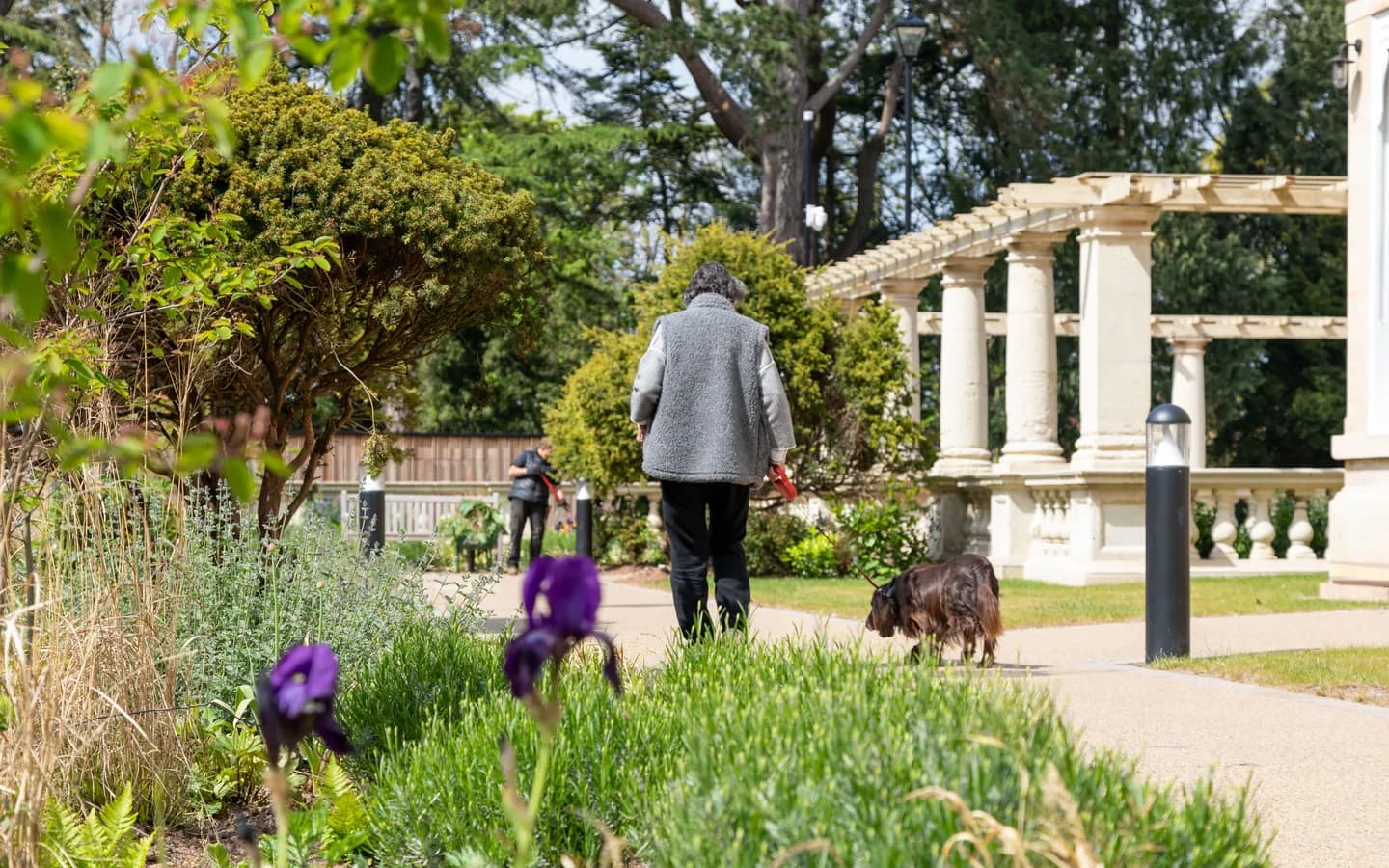 Lady and dog walking at Mount Battenhall