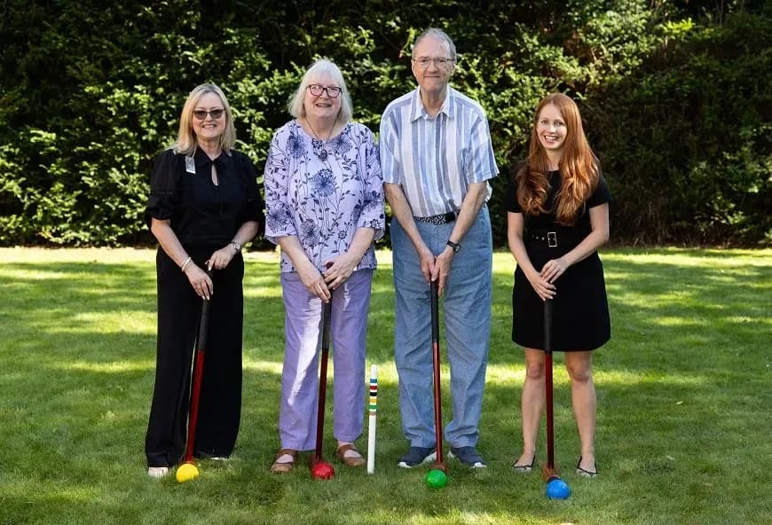 People playing croquet