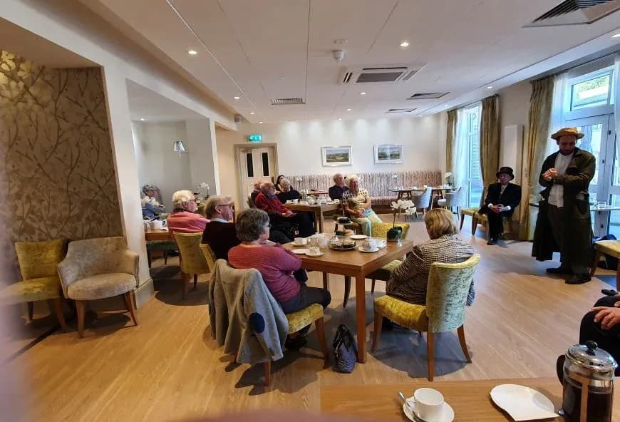 Residents watching the speaker from the ghost talk.