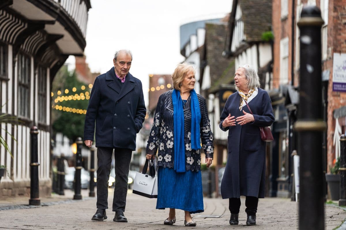 Residents walking through Worcester city centre