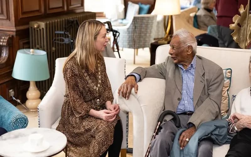 Mayor Allcott talking to a homeowner