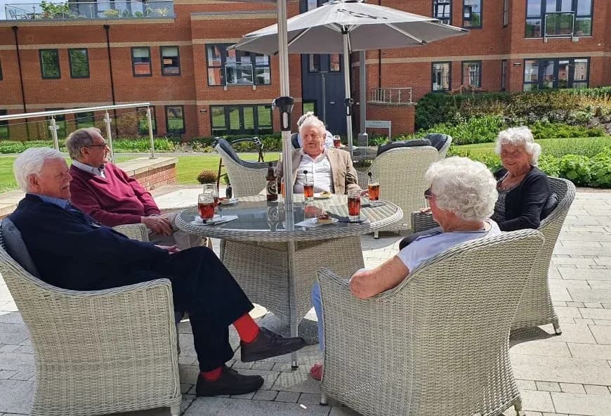 Residents drinking pimms outside