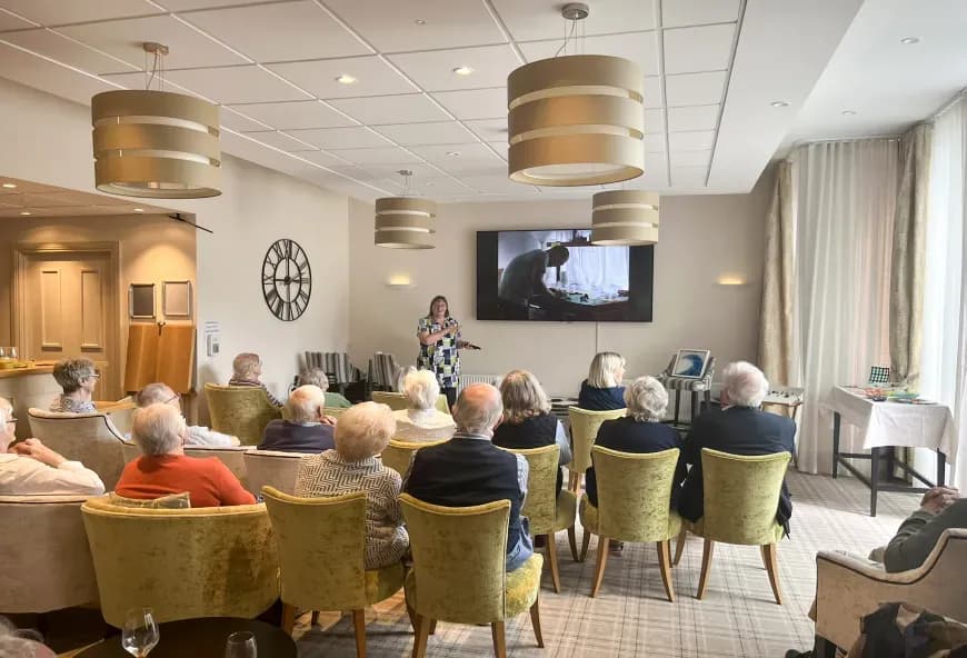 Woman presenting monthly talk