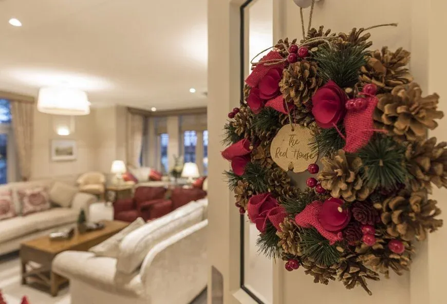 A wreath on a door to a living area