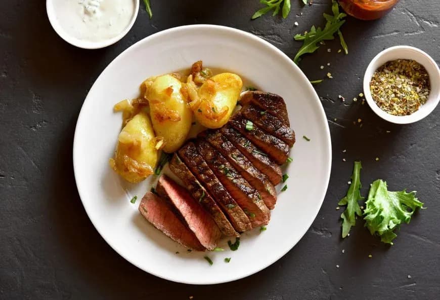 A steak and potatoes