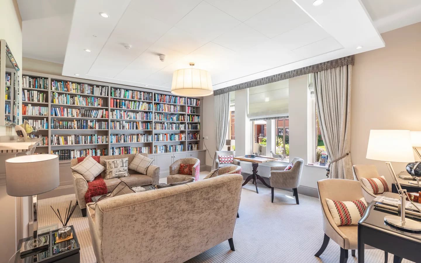 A living room with a bookshelf