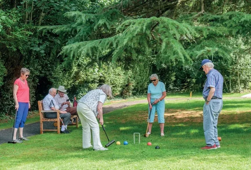 Residents playing a game outside