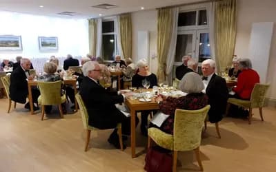 Residents sat in black tie