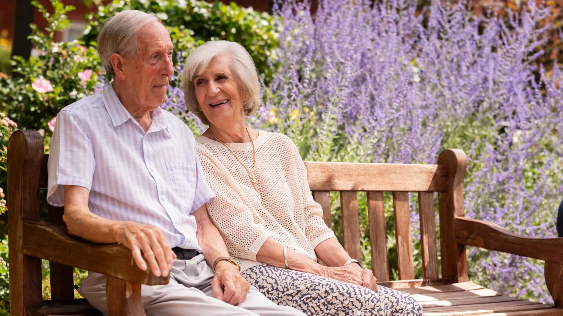 Boughton Hall residents sat on a garden bench