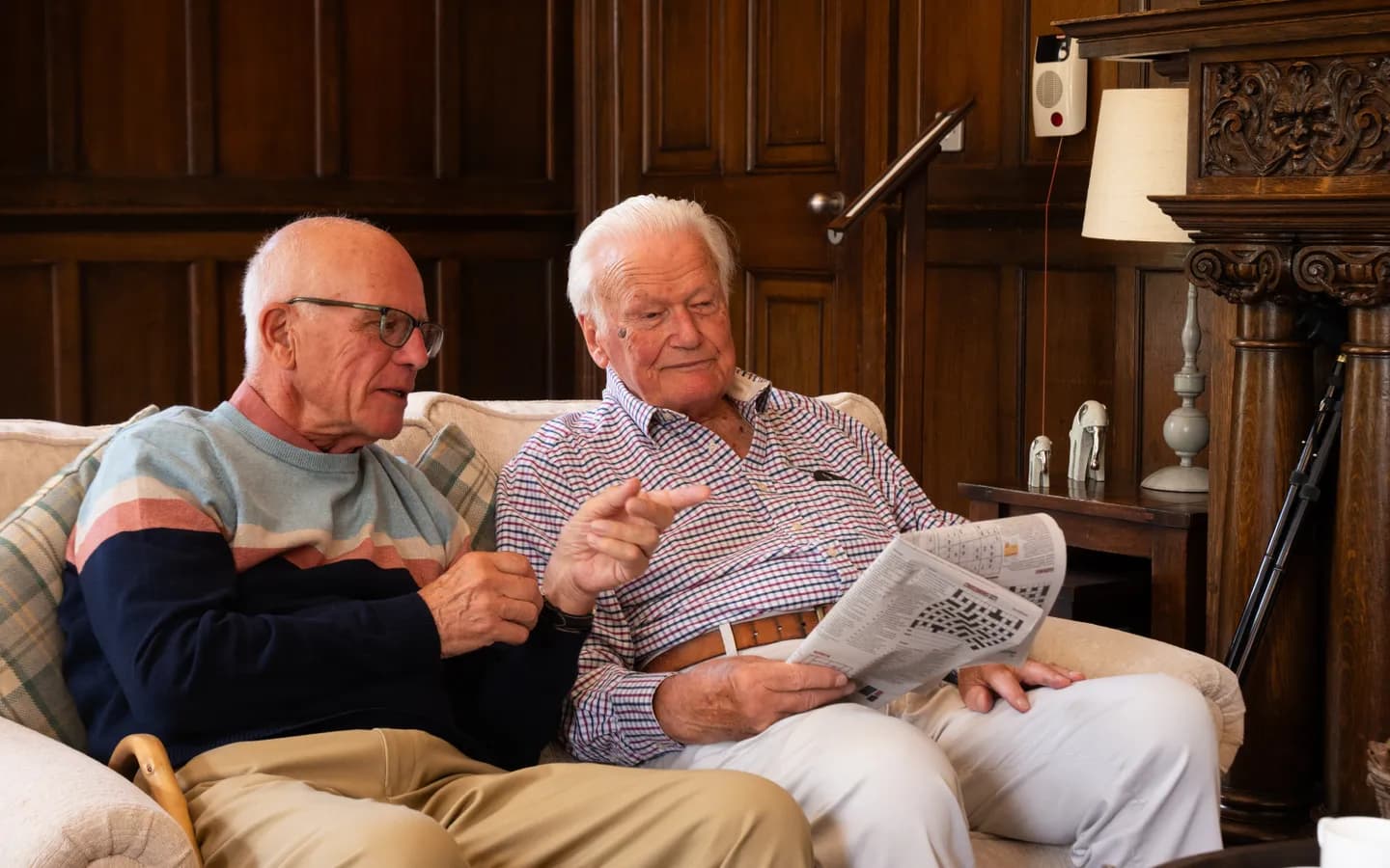 Boughton Hall residents sat reading the paper
