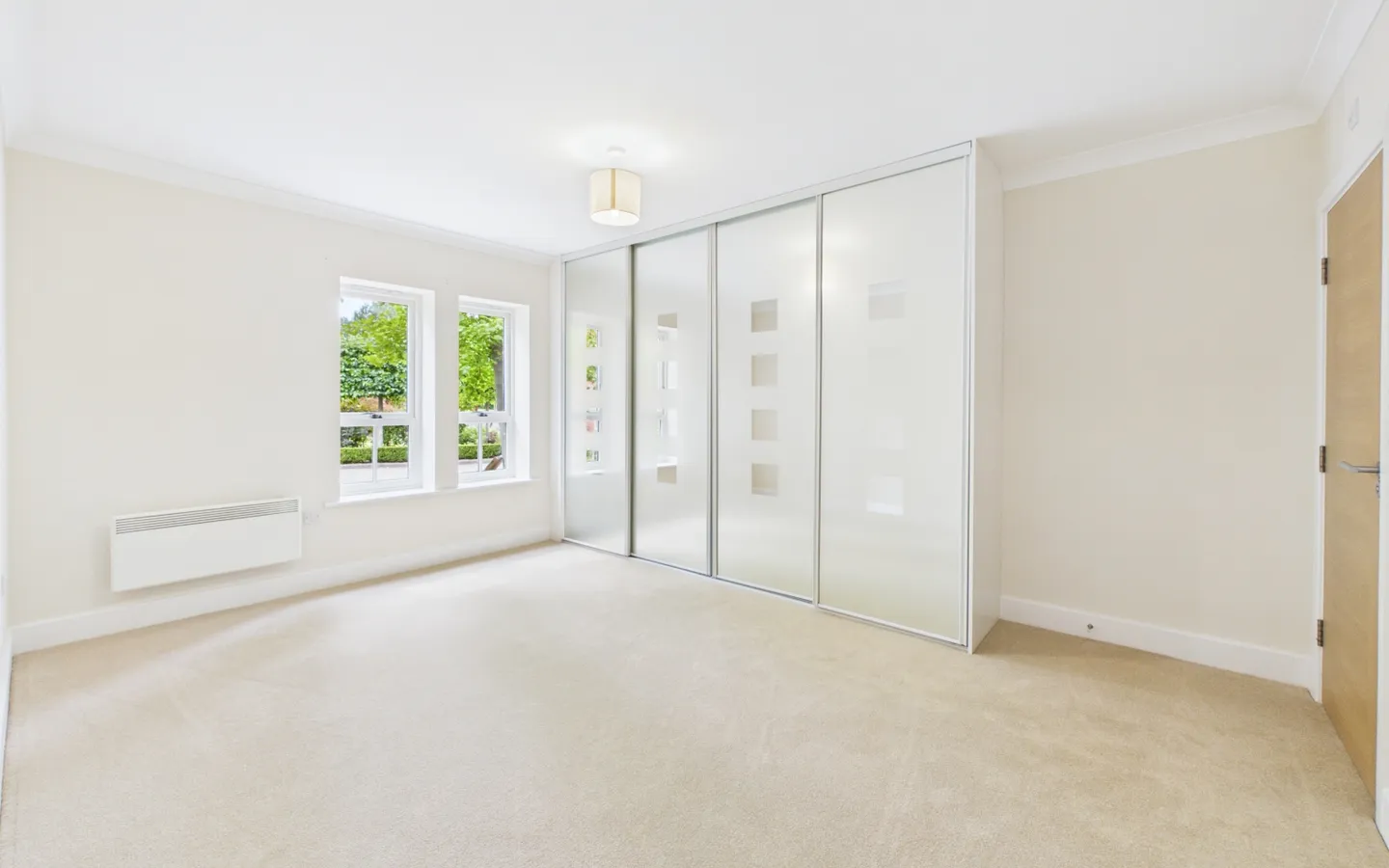 Apartment 26, Boughton Hall, bedroom with built in wardrobe