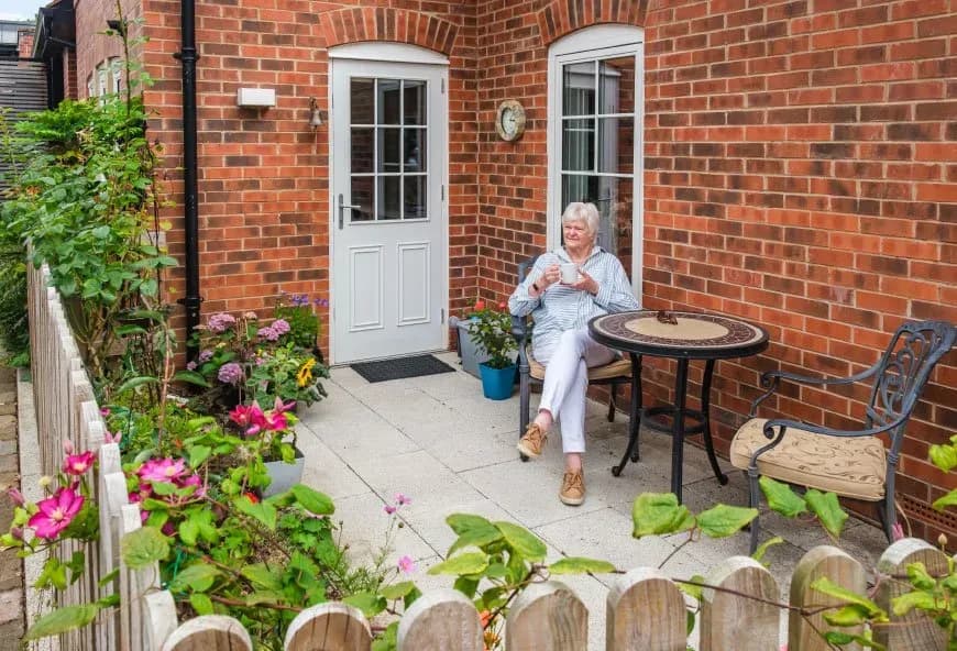 Women sat having a tea outside
