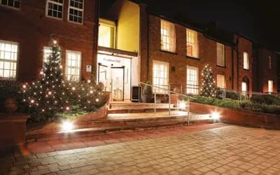 Boughton Hall entrance with Christmas lights