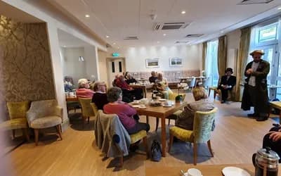 Residents watching the speaker from the ghost talk.