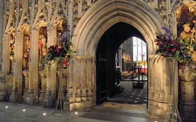 An arch entrance to a cathedral