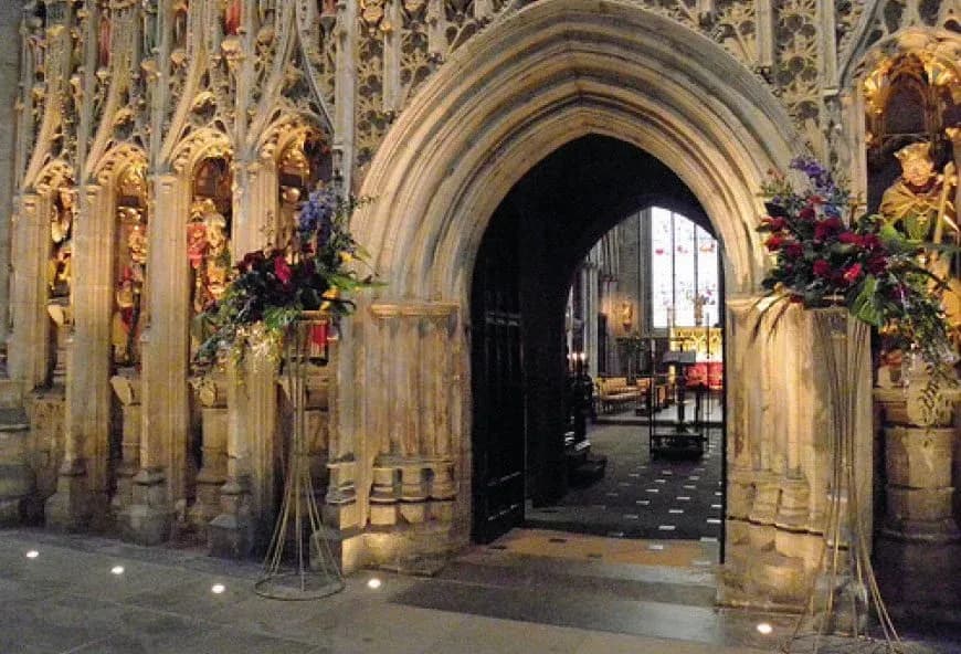 An arch entrance to a cathedral