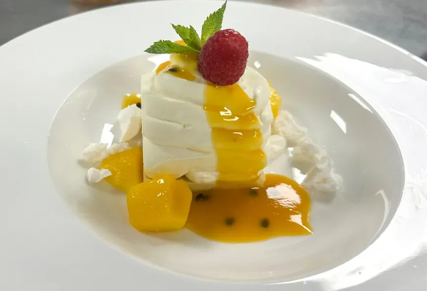 Ice cream with a raspberry and mint