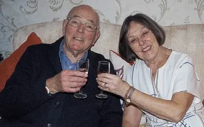 Residents celebrating New Year's Eve with a glass of fizz