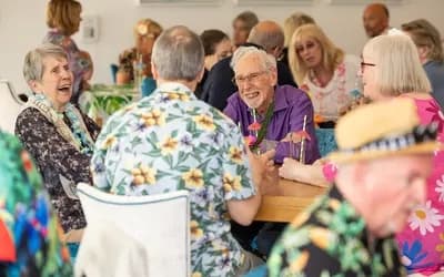 Mount Battenhall homeowners laughing together