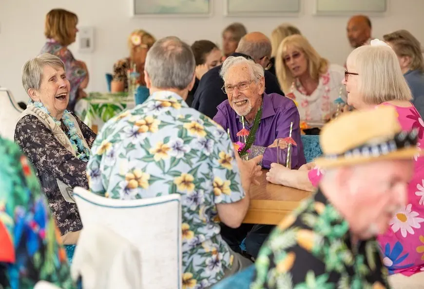 Mount Battenhall homeowners laughing together