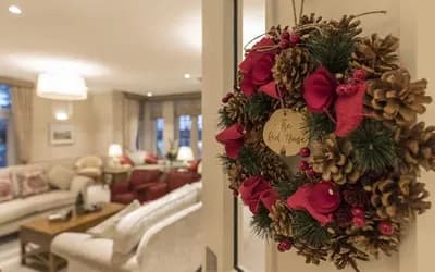A wreath on a door to a living area