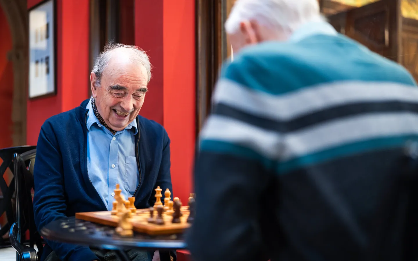 Residents playing chess at Mount Battenhall