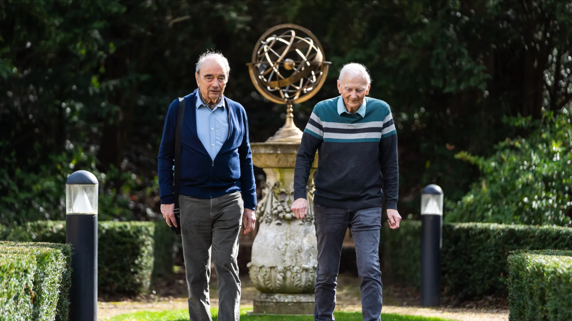 Residents walking through Mount Battenhall grounds