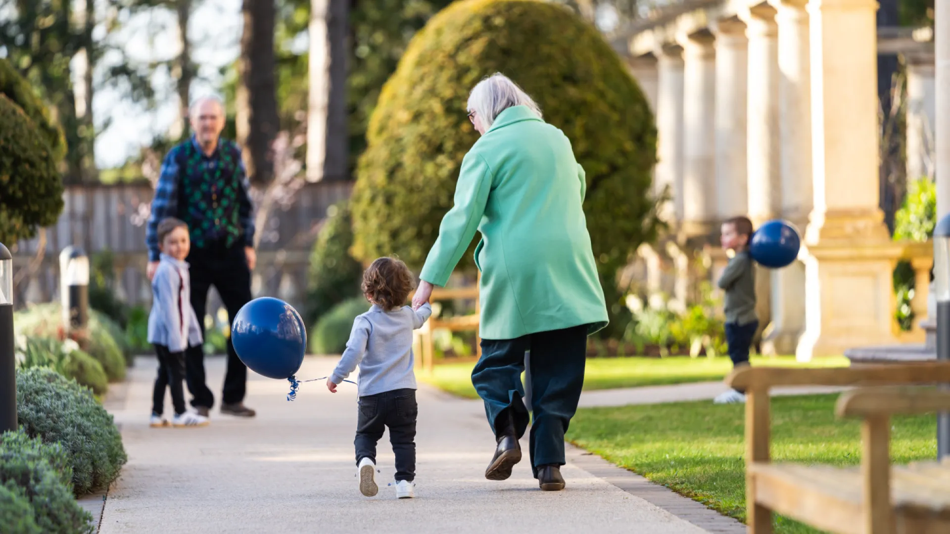 Residents with grandchildren in the grounds