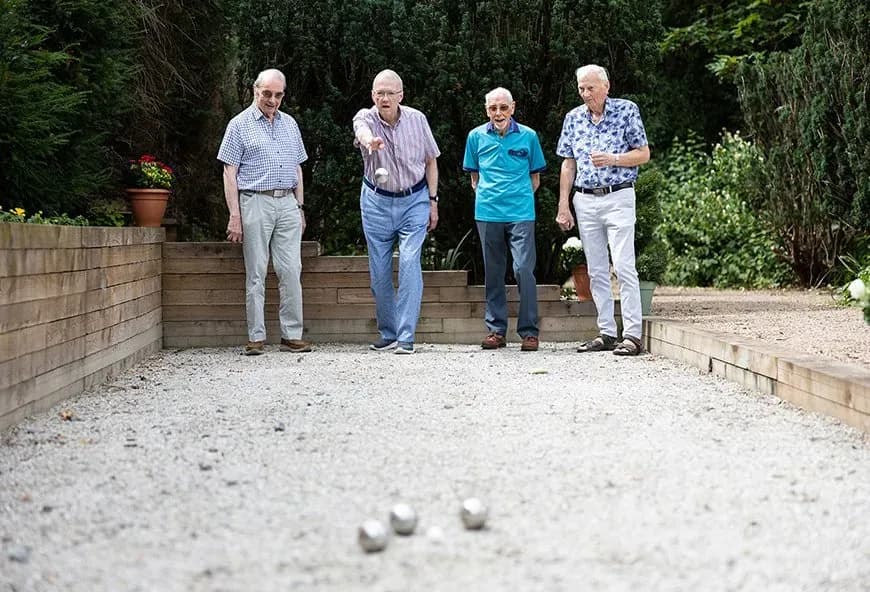 Men playing bowls