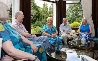 Group of people sitting and talking
