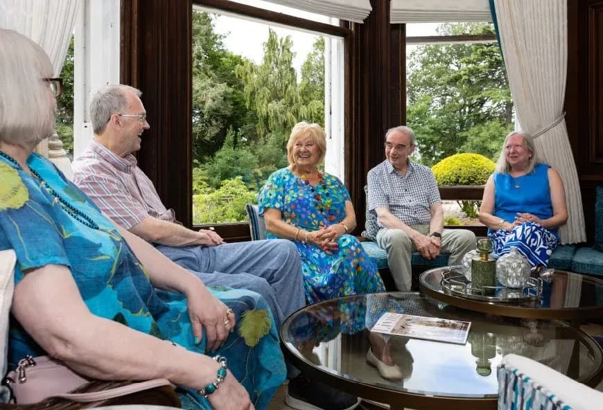 Group of people sitting and talking