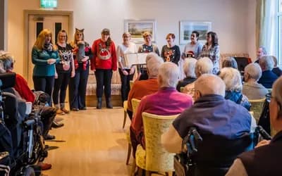A christmas choir at the red house