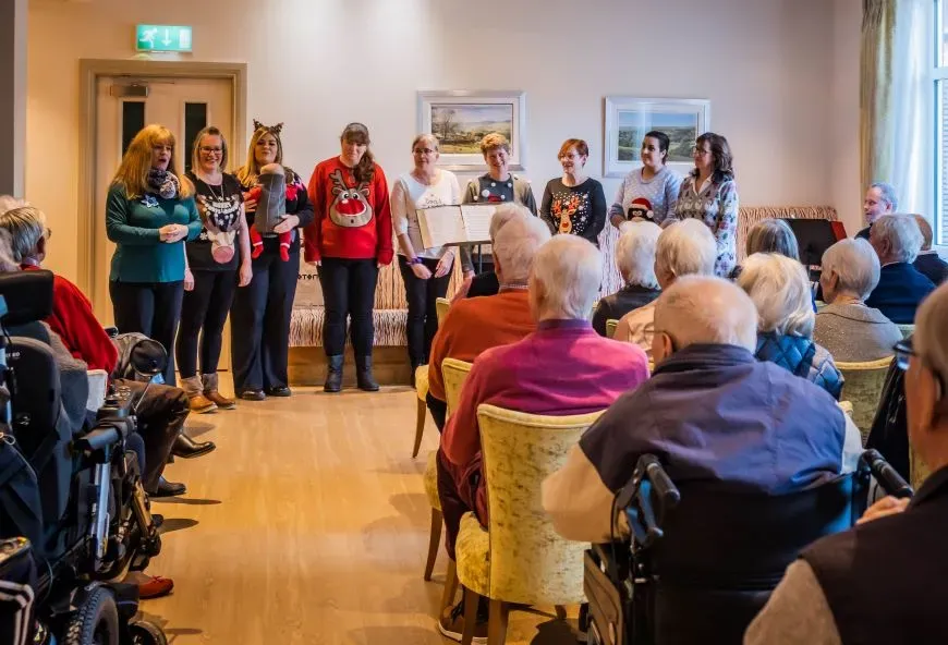 A christmas choir at the red house