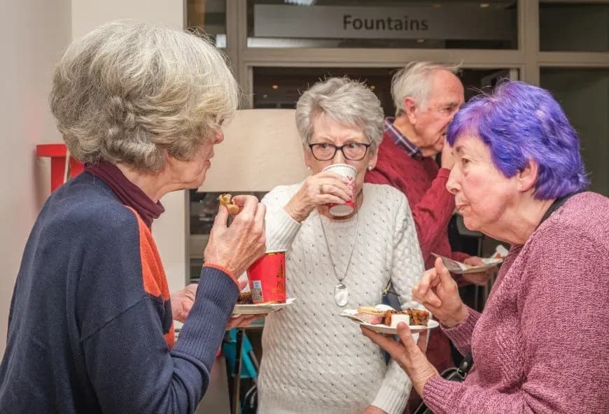 Women enjoying mince pies at The Red House