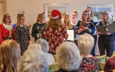 Choir singing at The Red House