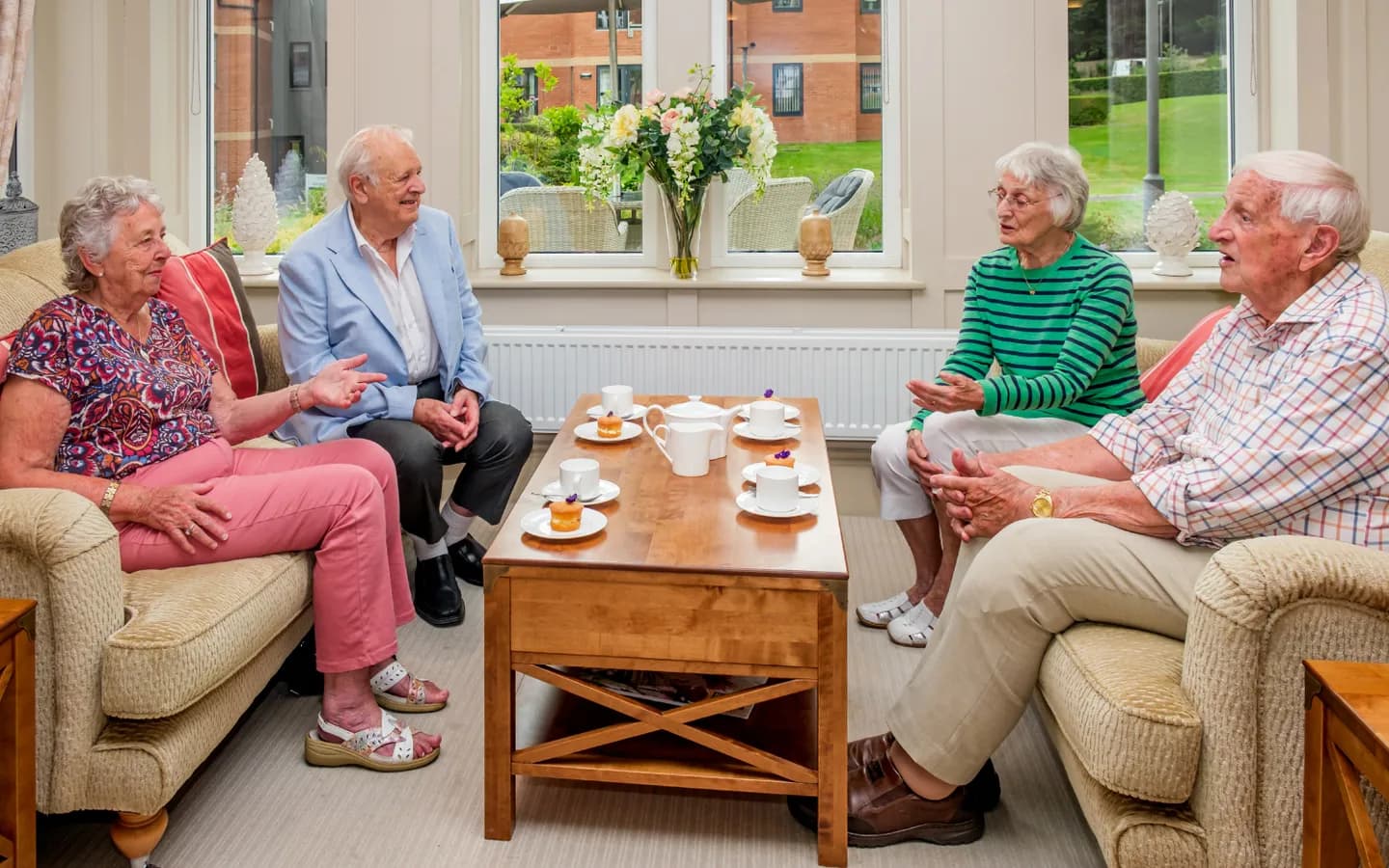 The Red House residents enjoying tea and cakes