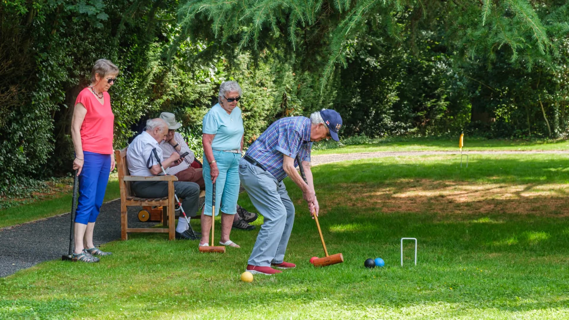 The Red House residents playing croquet