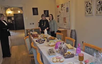 Bake sale table with Boughton Hall residents